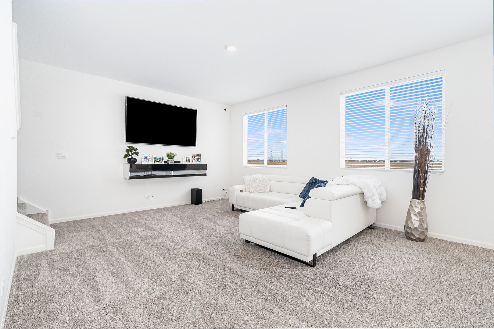 382 Hemlock Lane Oswego, IL 60543 - Photo 6 of 17 a living room with furniture and a flat screen tv