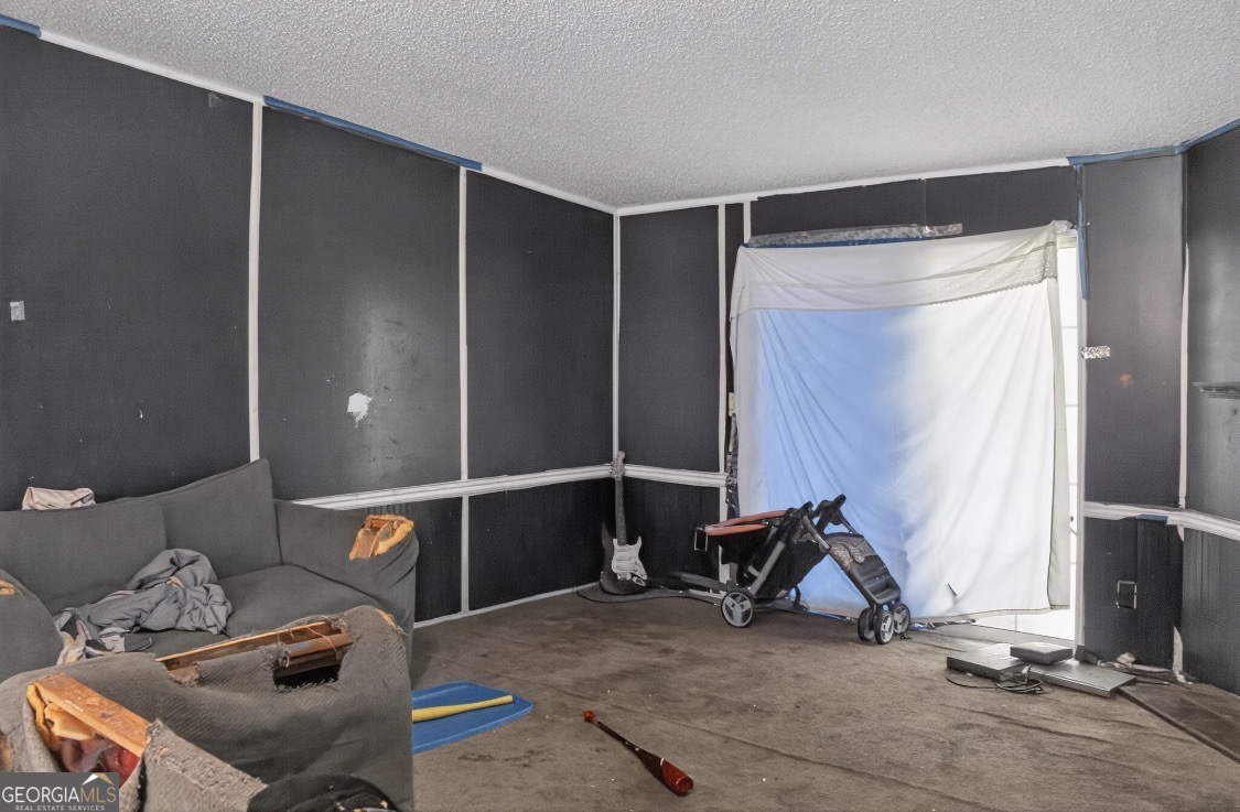 4402 Harper Road Metter, GA 30439 - Photo 14 of 19 a view of a room with gym equipment