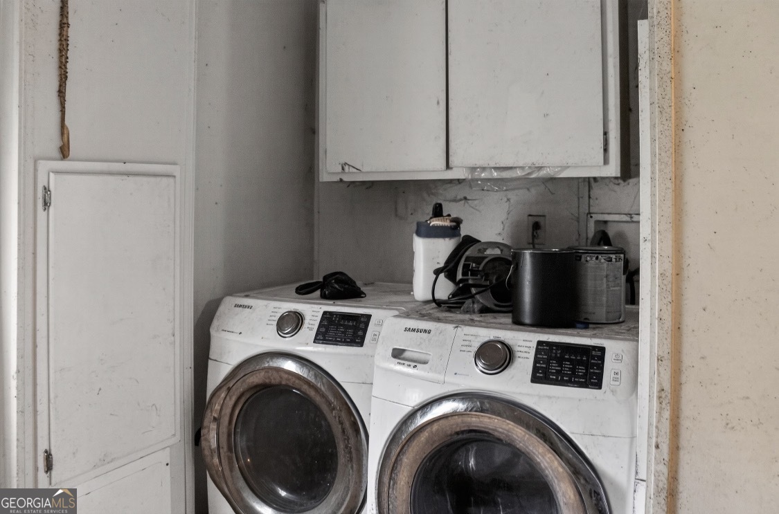 4402 Harper Road Metter, GA 30439 - Photo 19 of 19 a utility room with dryer and washer