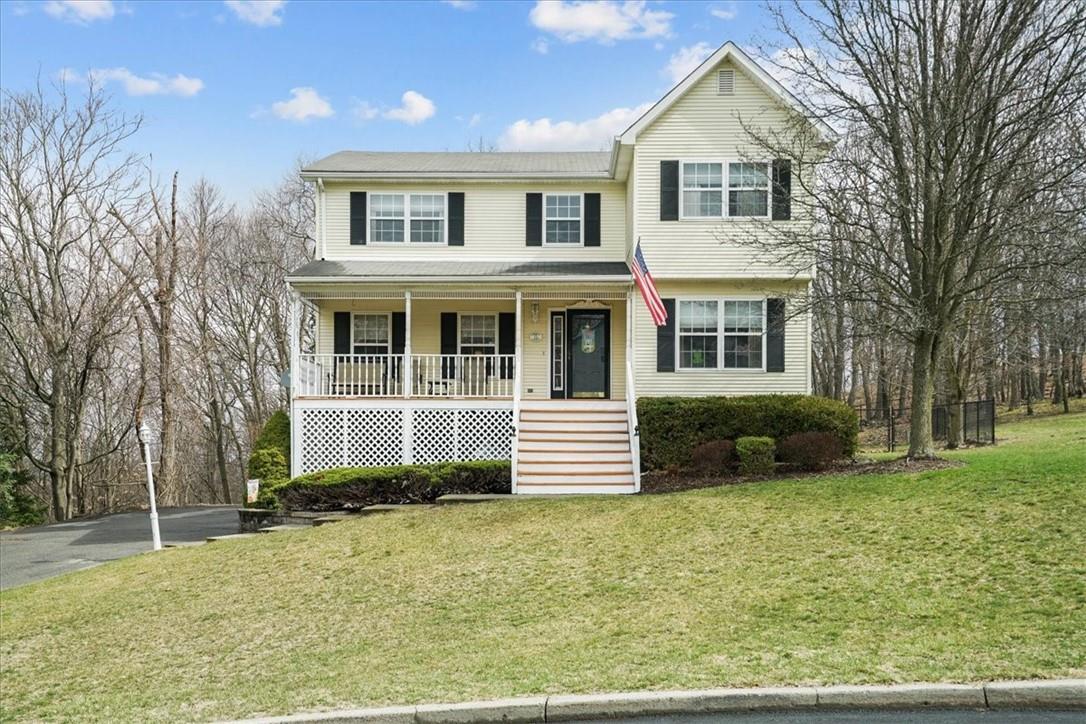12 Cambridge Circle Monroe, NY 10950 - Photo 1 of 1 a front view of a house with a yard