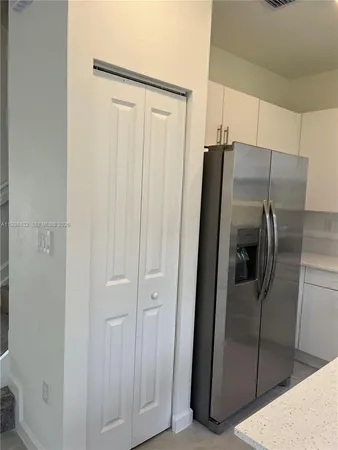 a view of an empty walk in closet