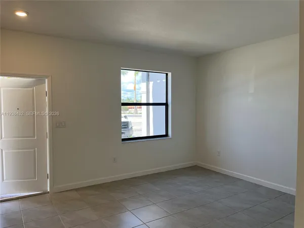 an empty room with a window