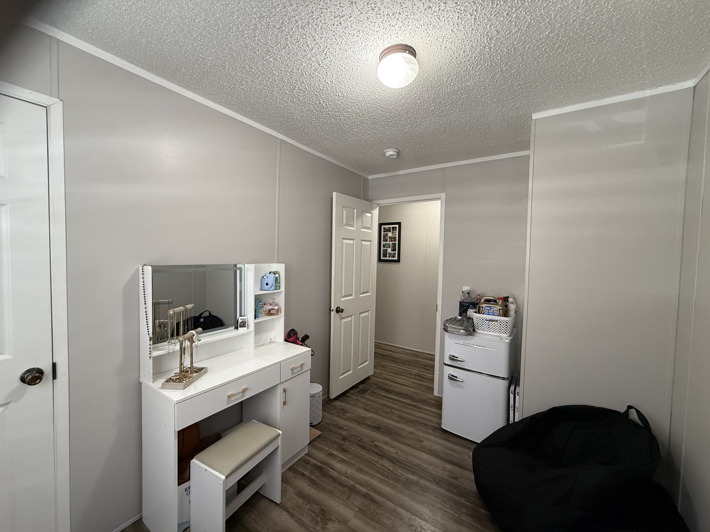 38455 North Sheridan Road, Unit 768 Beach Park, IL 60087 - Photo 11 of 15 a room with a bed and a television