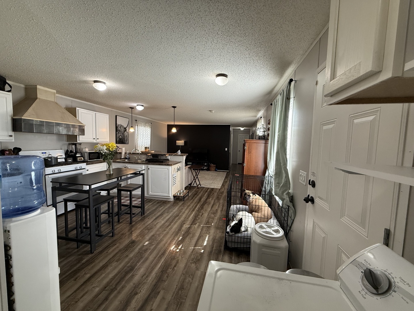 38455 North Sheridan Road, Unit 768 Beach Park, IL 60087 - Photo 6 of 15 a kitchen with granite countertop a sink a counter top space stainless steel appliances and a window