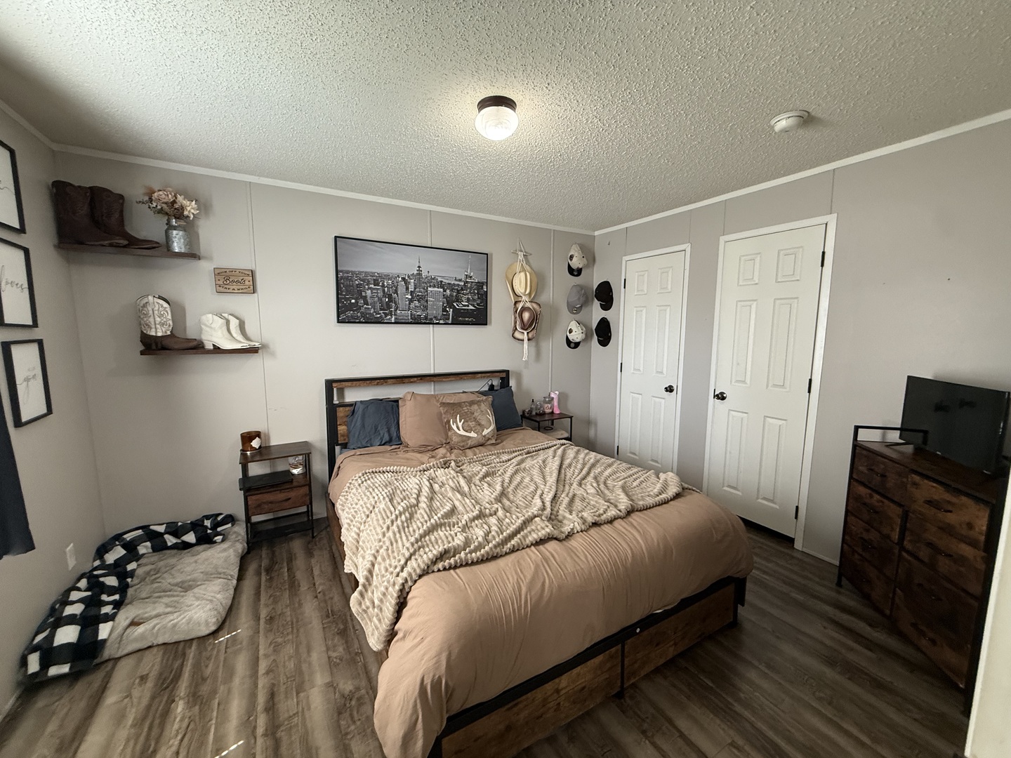 38455 North Sheridan Road, Unit 768 Beach Park, IL 60087 - Photo 7 of 15 a bedroom with a bed and wooden floor