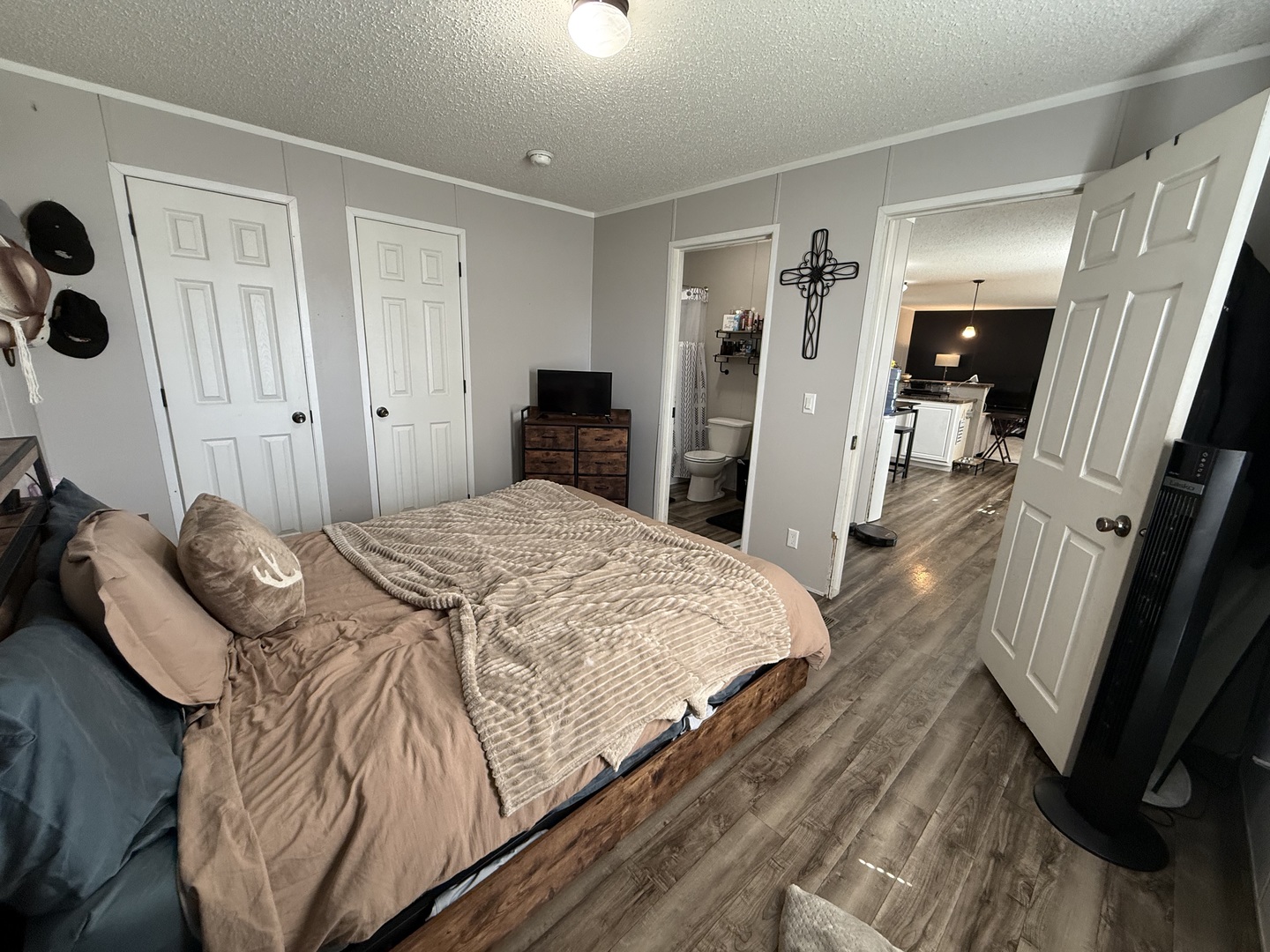 38455 North Sheridan Road, Unit 768 Beach Park, IL 60087 - Photo 8 of 15 a bedroom with a bed and a mirror