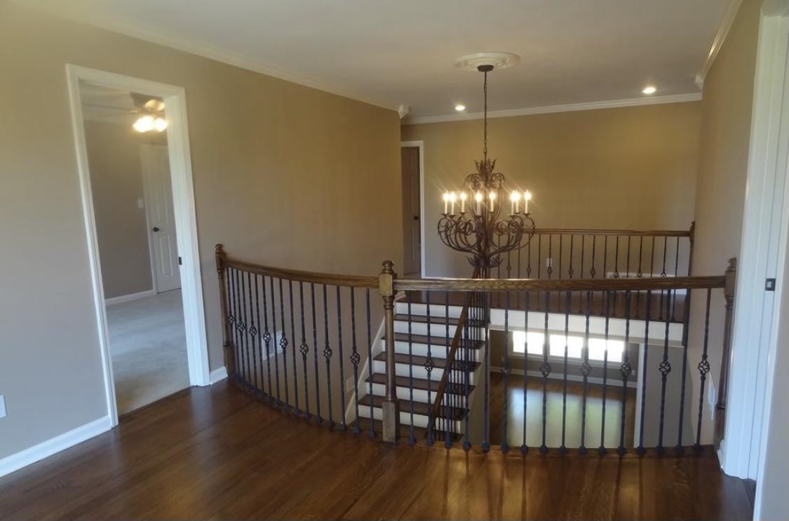 1042 Summer Spring Road Collierville, TN 38017 - Photo 20 of 21 a view of entryway and hall with wooden floor