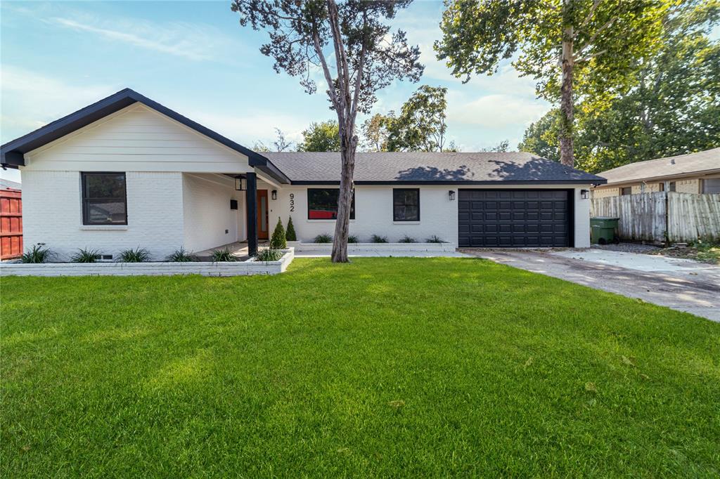 932 Treasure Road Garland, TX 75041 - Photo 2 of 23 a front view of house with yard and green space