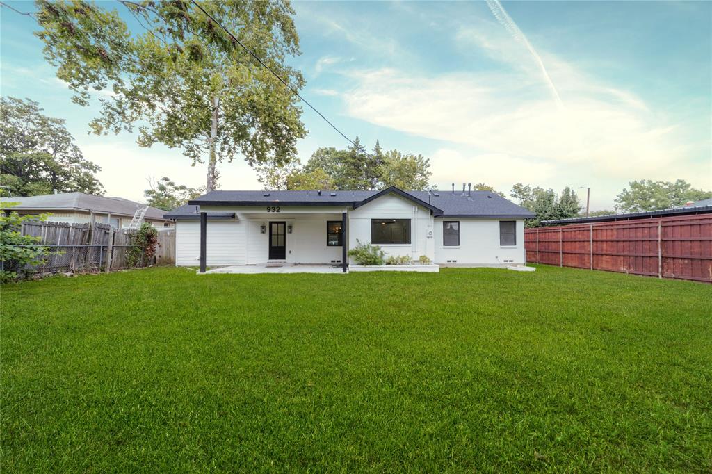 932 Treasure Road Garland, TX 75041 - Photo 21 of 23 a front view of a house with a garden