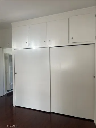 a view of a refrigerator in kitchen