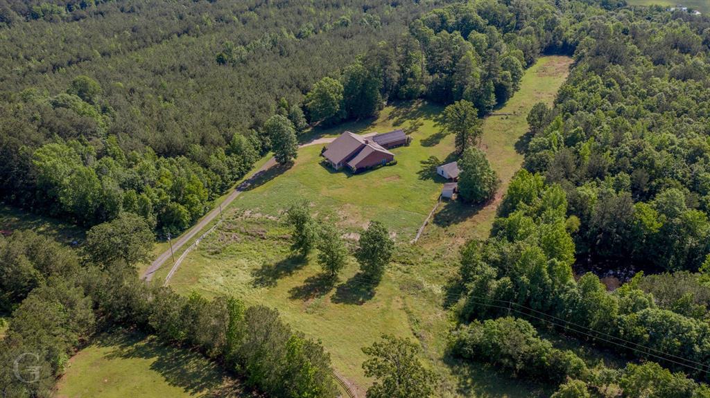 1212 WPA Road Homer, LA 71040 - Photo 32 of 35 Overview of rural landscape featuring a heavily wooded area