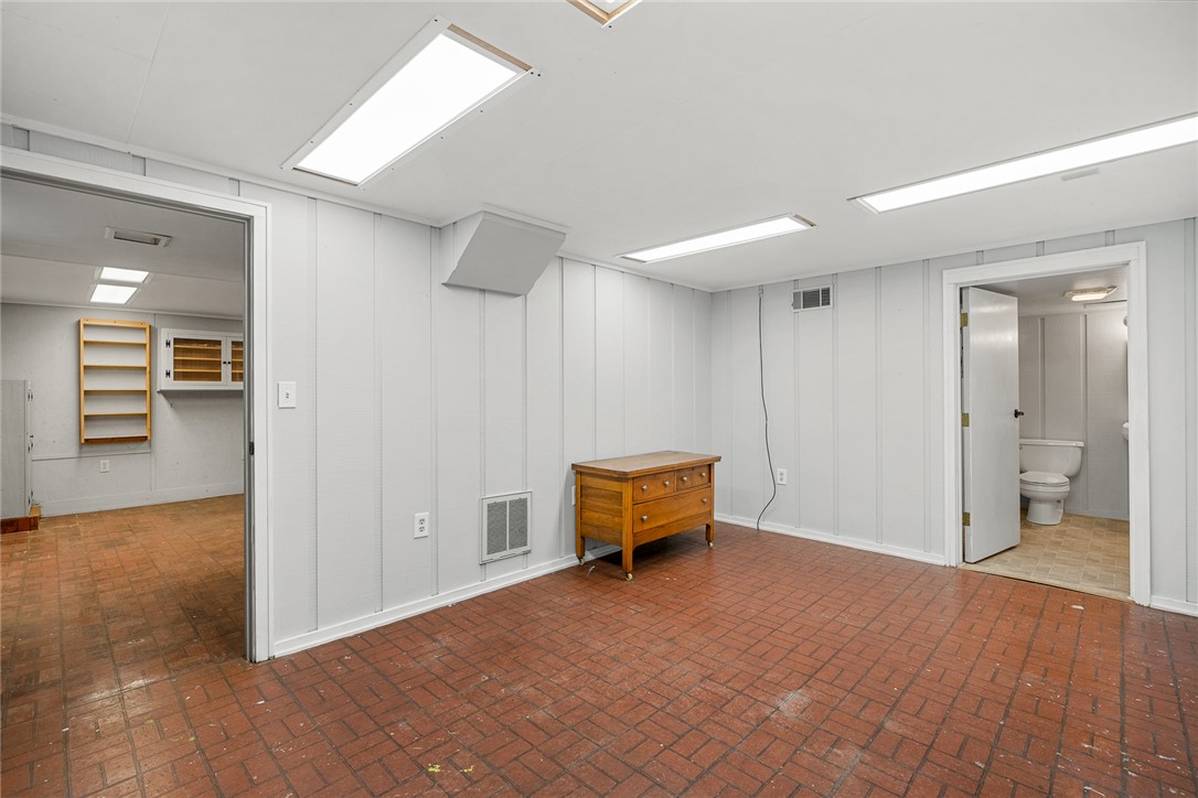 1403 Hanover Road Anderson, SC 29621 - Photo 25 of 40 This spacious area features durable flooring, offering versatile functionality for various needs.
