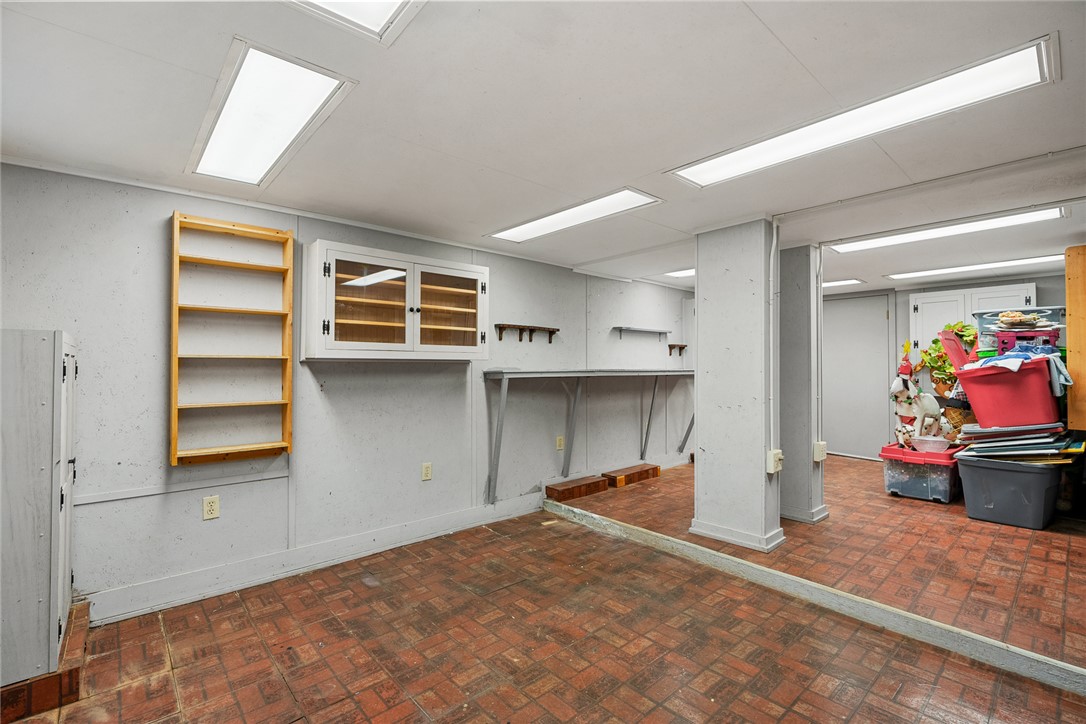1403 Hanover Road Anderson, SC 29621 - Photo 29 of 40 This versatile space features durable brick flooring and bright overhead lighting.