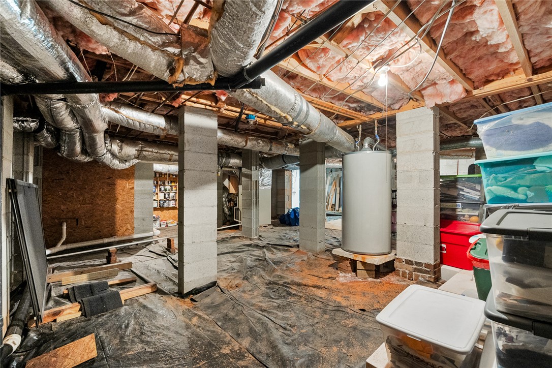 1403 Hanover Road Anderson, SC 29621 - Photo 32 of 40 This functional basement space offers practical utility and ample room for storage or future customization.