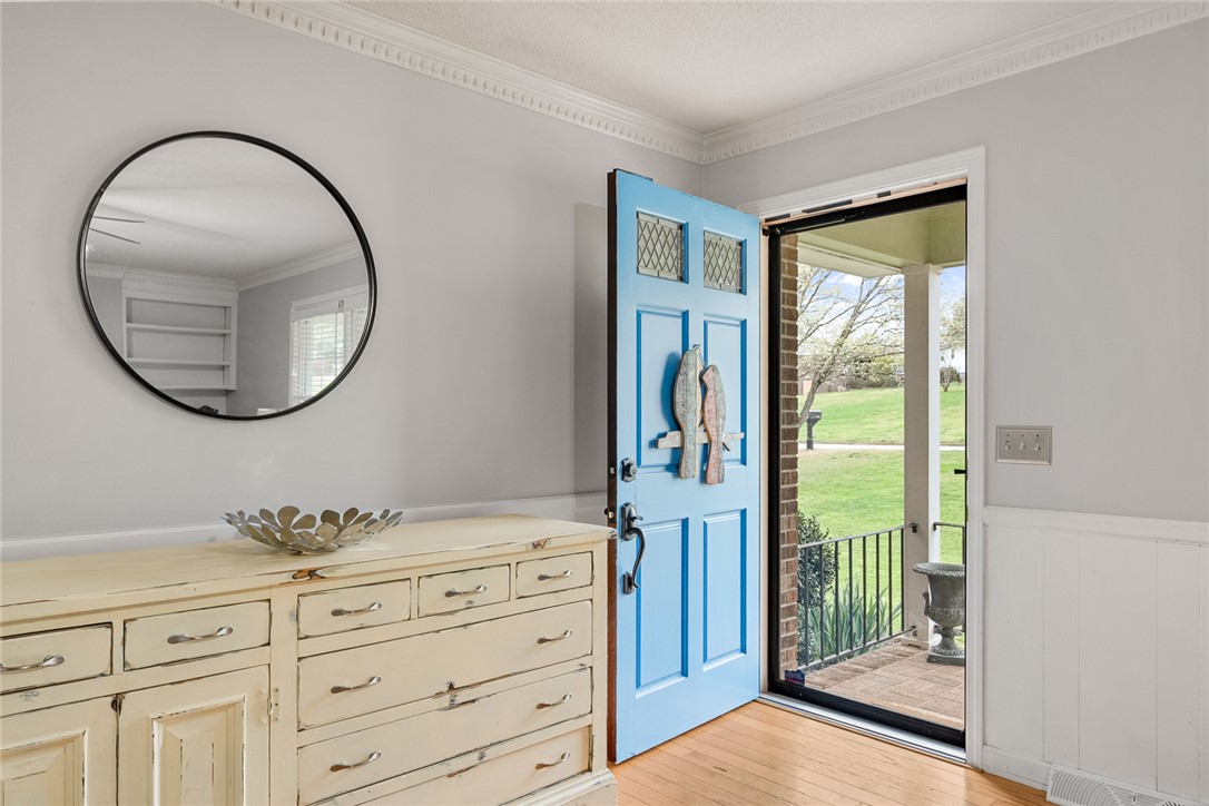 1403 Hanover Road Anderson, SC 29621 - Photo 6 of 40 Step into this home featuring hardwood floors and elegant crown molding.