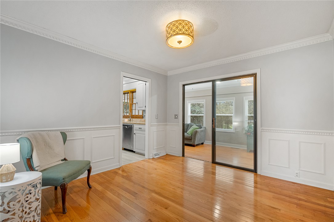 1403 Hanover Road Anderson, SC 29621 - Photo 10 of 40 This versatile space features hardwood floors and a view into the adjacent living area, offering flexible living.
