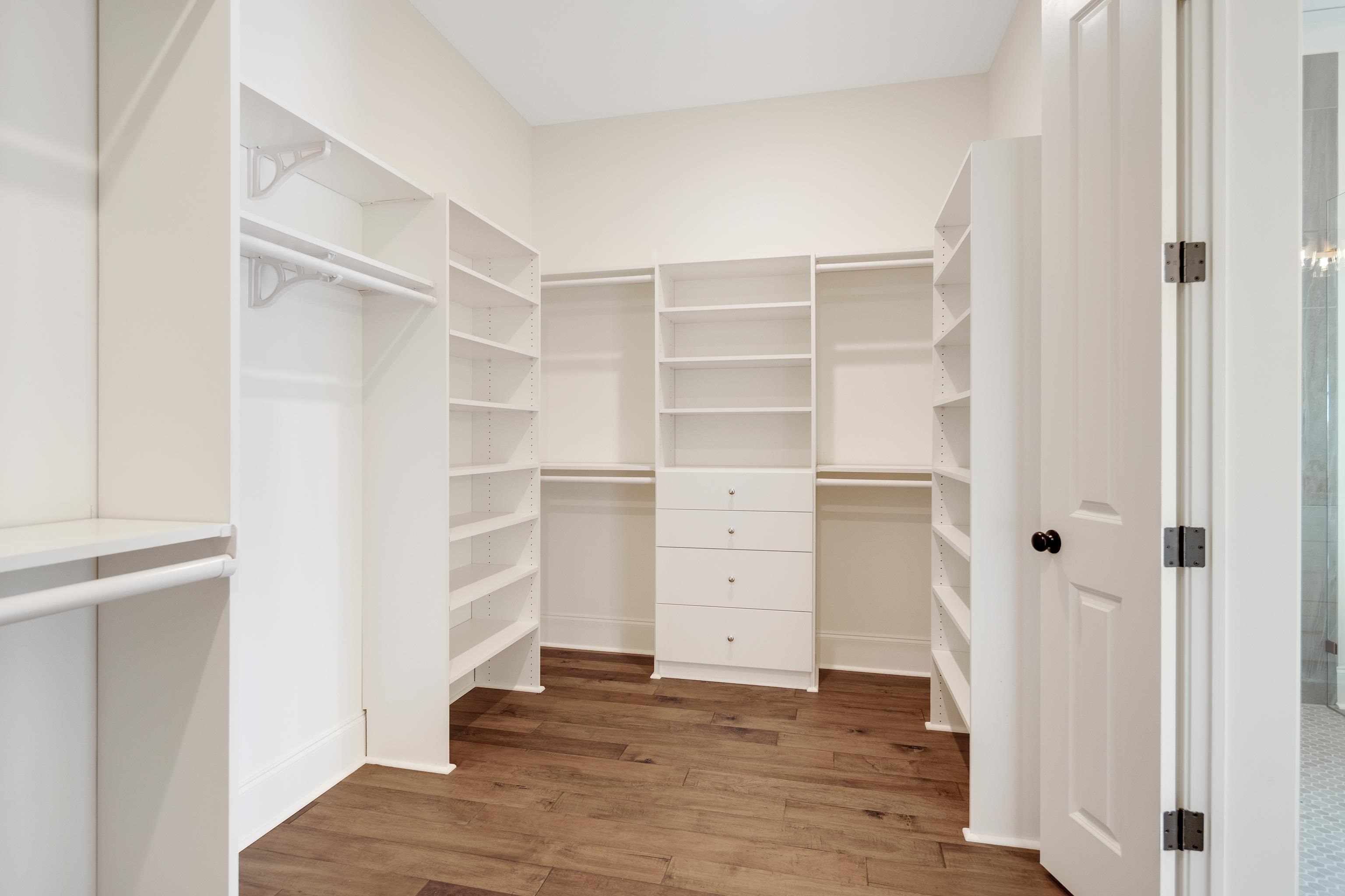 10145 Nighthawk Cove Collierville, TN 38017 - Photo 14 of 25 a view of closet area with empty racks