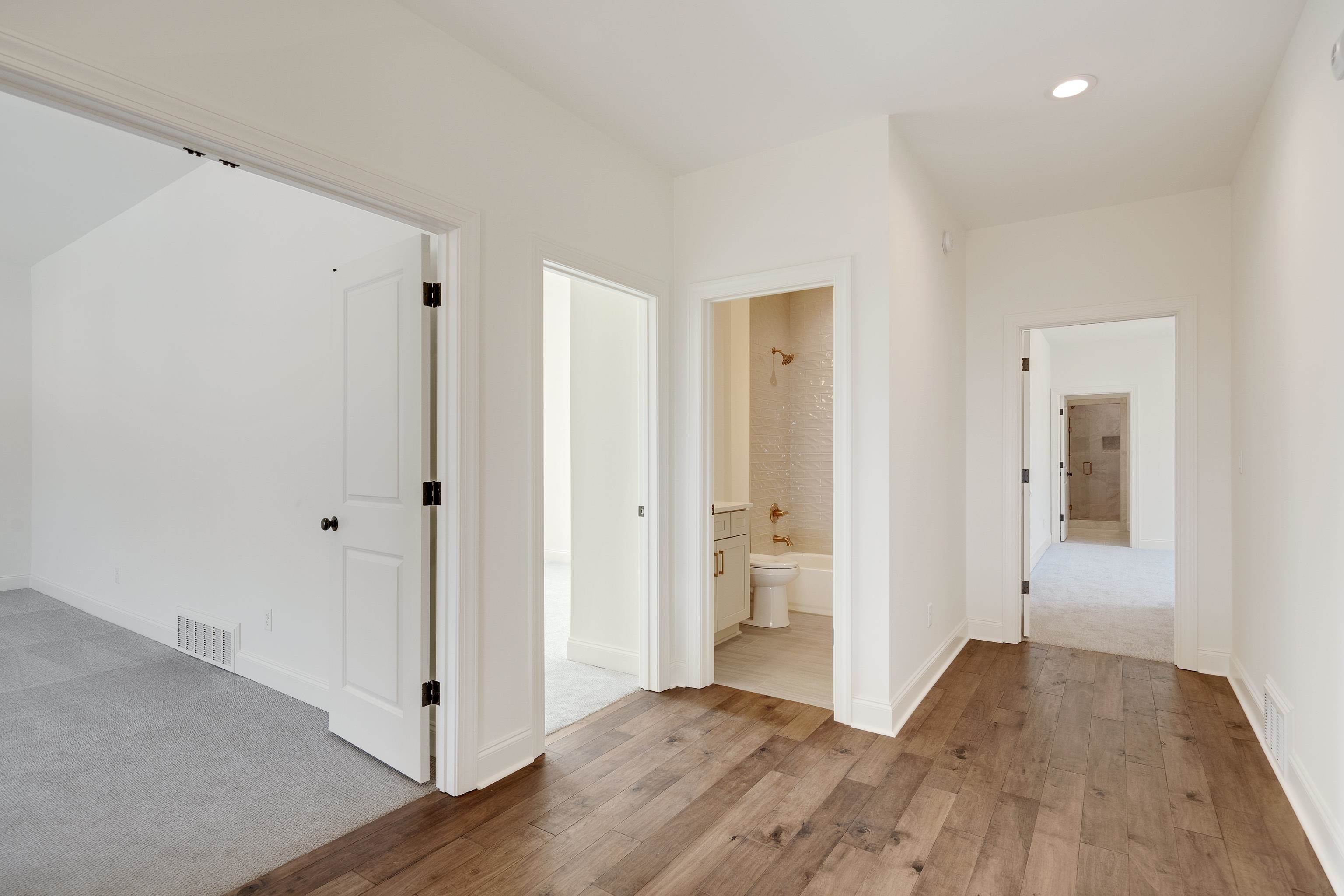 10145 Nighthawk Cove Collierville, TN 38017 - Photo 17 of 25 wooden floor in an empty room