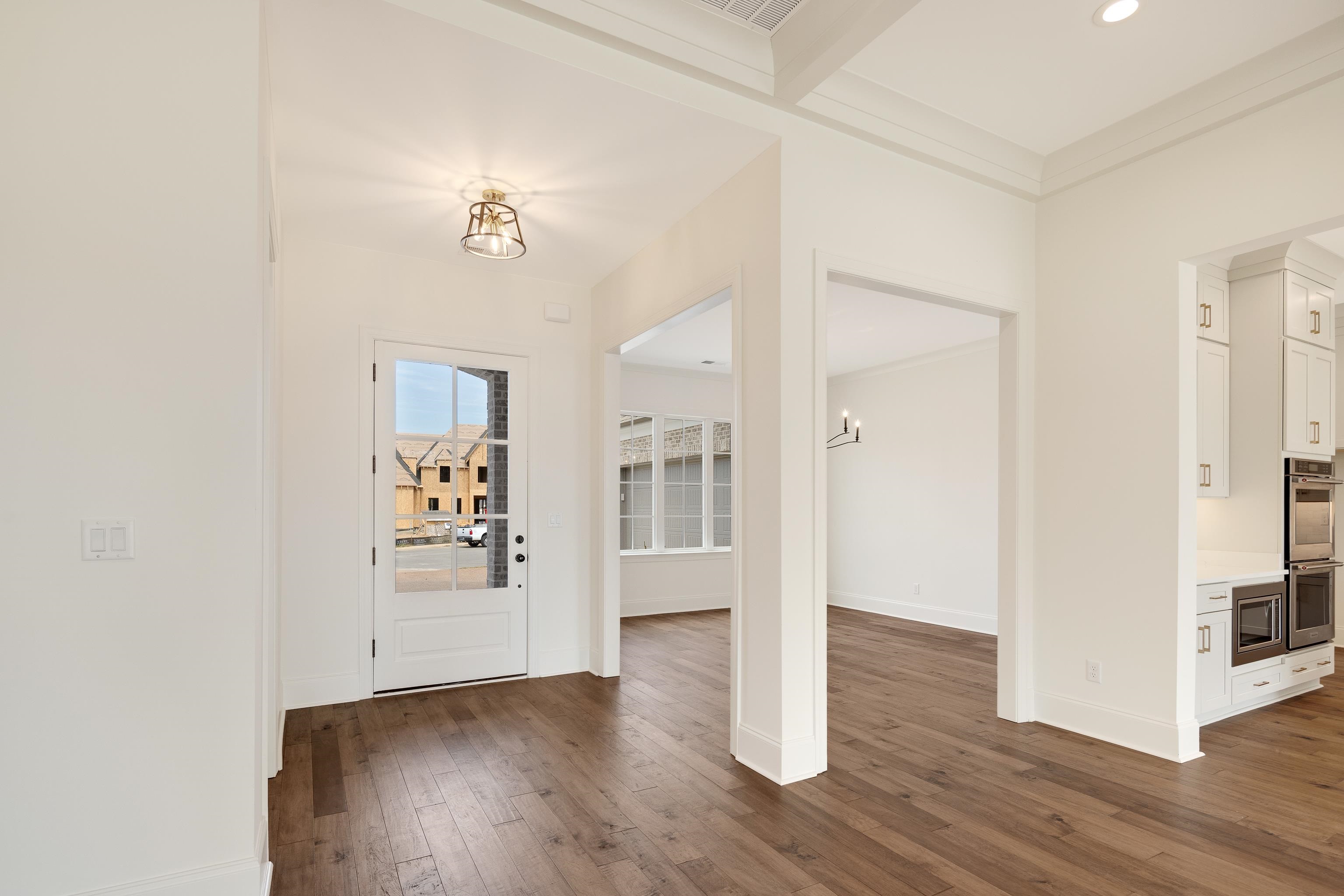 10145 Nighthawk Cove Collierville, TN 38017 - Photo 2 of 25 wooden floor in an empty room