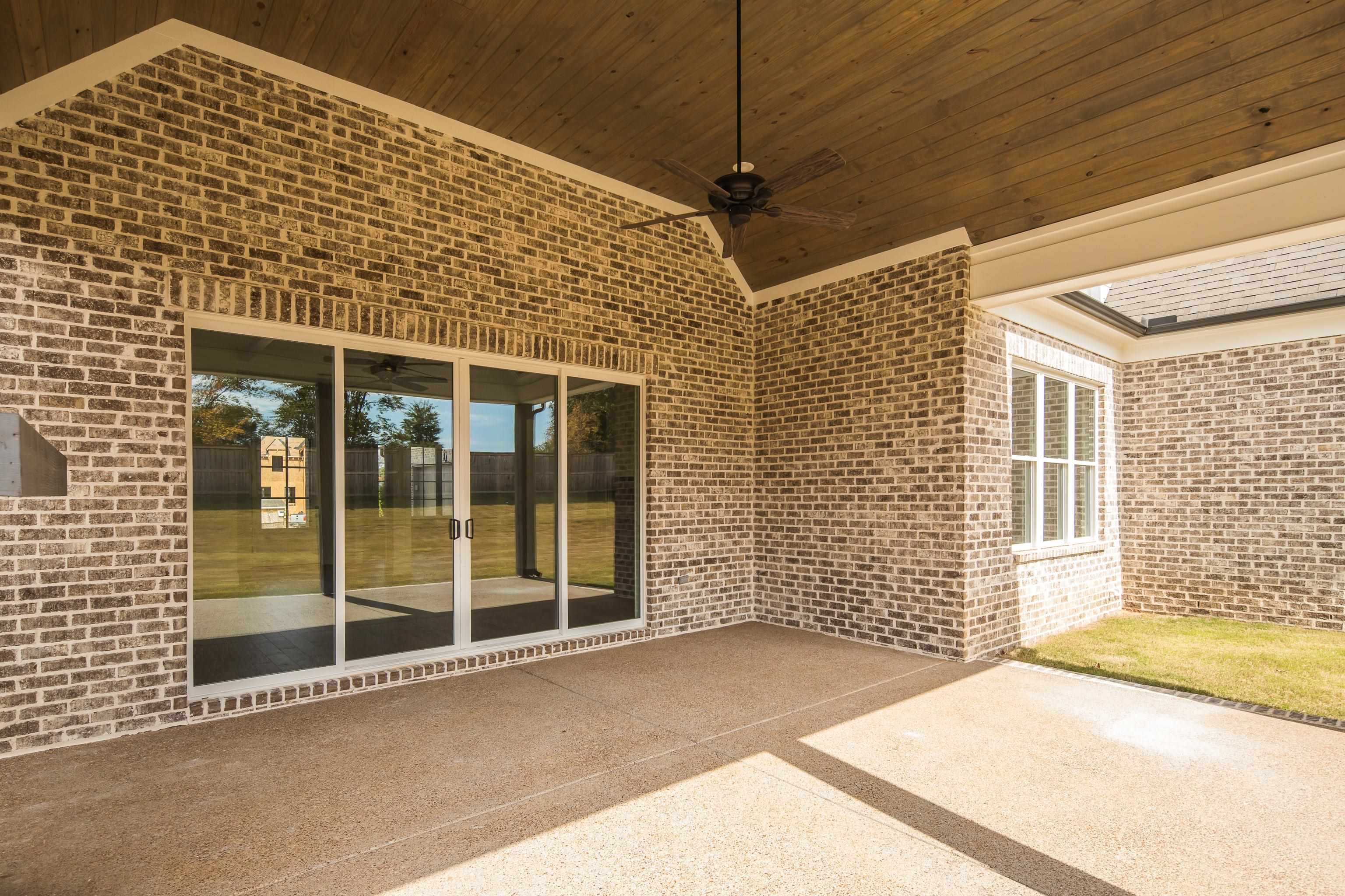 10145 Nighthawk Cove Collierville, TN 38017 - Photo 23 of 25 a view of a balcony with a ceiling fan