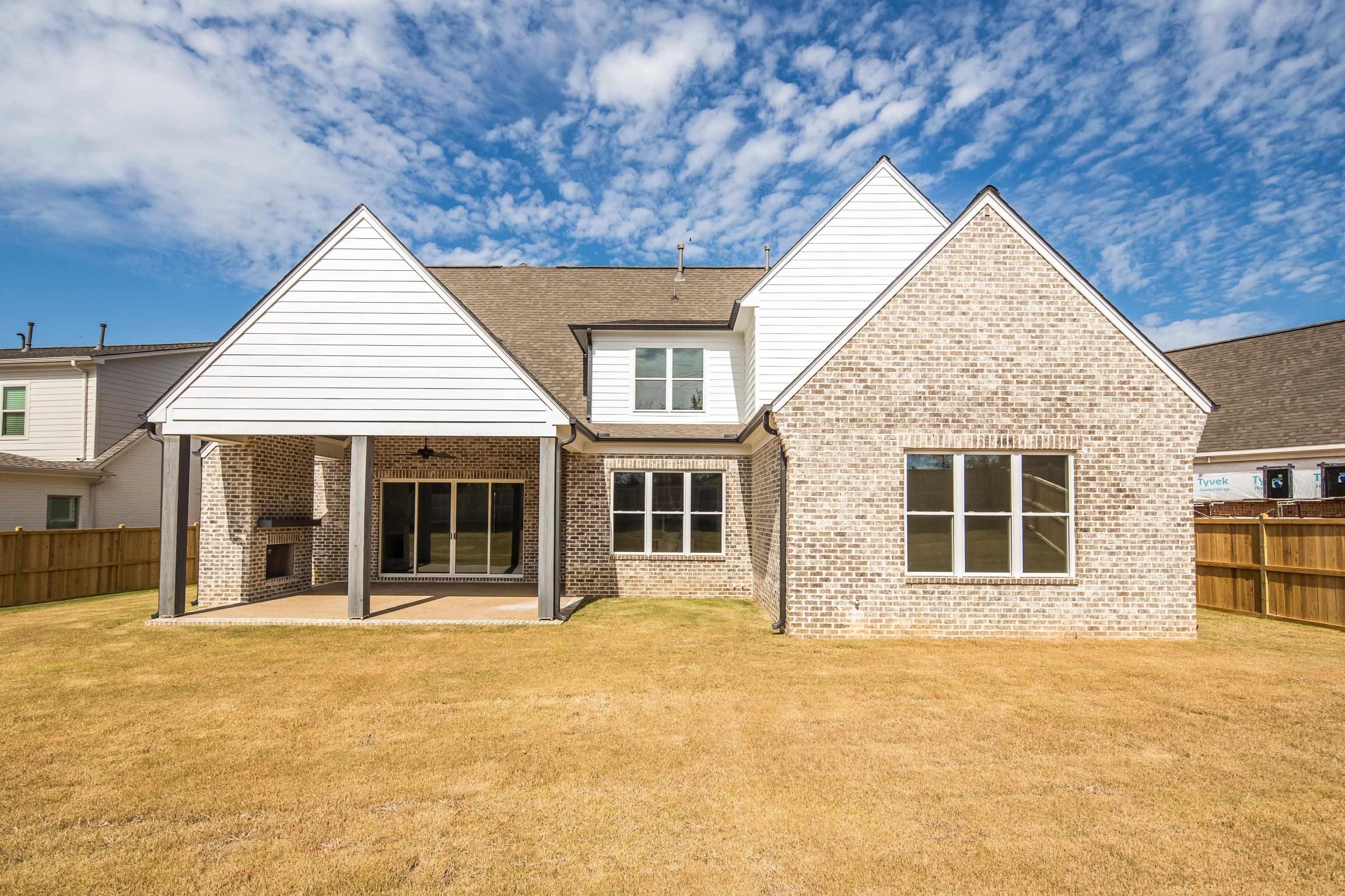 10145 Nighthawk Cove Collierville, TN 38017 - Photo 24 of 25 front view of a house with a yard