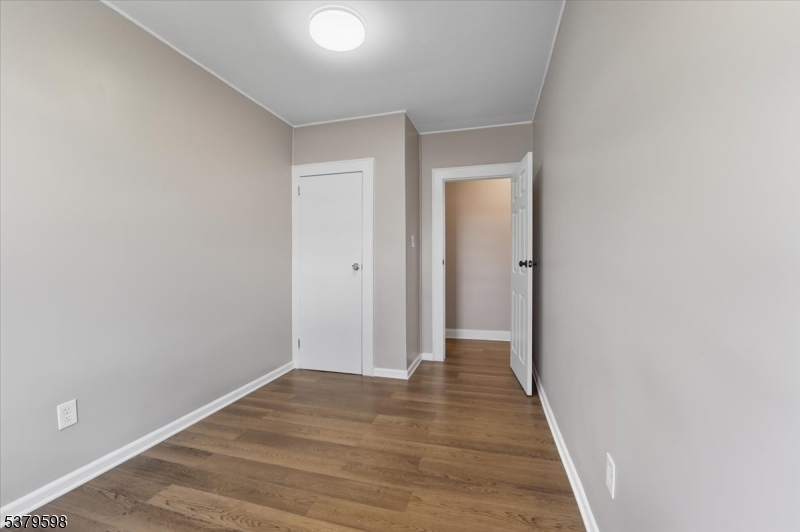102 Exton Avenue, Unit 1 North Arlington, NJ 07031 - Photo 13 of 18 a view of hallway with wooden floor