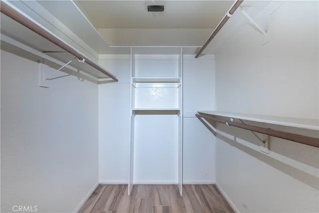 a view of an empty walk in closet
