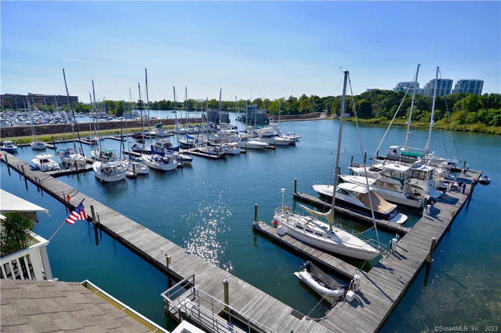 123 Harbor Drive, Unit 512 Stamford, CT 06902 - Photo 2 of 24 a view of a lake with a ocean view