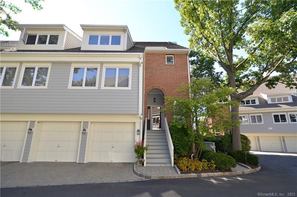 123 Harbor Drive, Unit 512 Stamford, CT 06902 - Photo 3 of 24 a front view of a building with garden