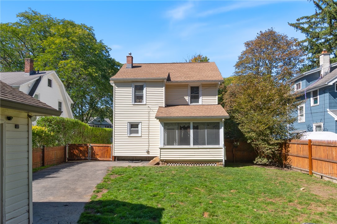 235 Wildmere Road Irondequoit, NY 14617 - Photo 2 of 41 The rear of the home - the fenced yard is a great place for your four (or two!) legged friends! FREE RANGE CHICKENS are WELCOME at this address!!