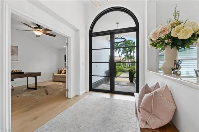 a view of a swimming pool and lounge chair