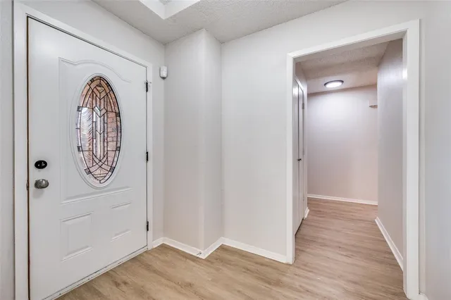 a view of a livingroom with wooden floor