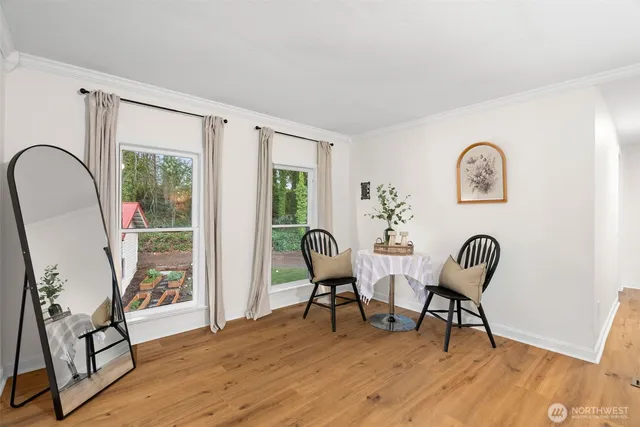 a workspace with furniture and a window