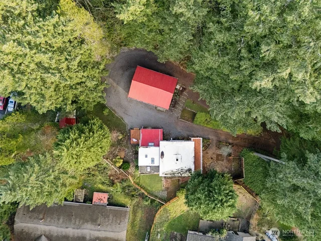 a small white house with a outdoor space