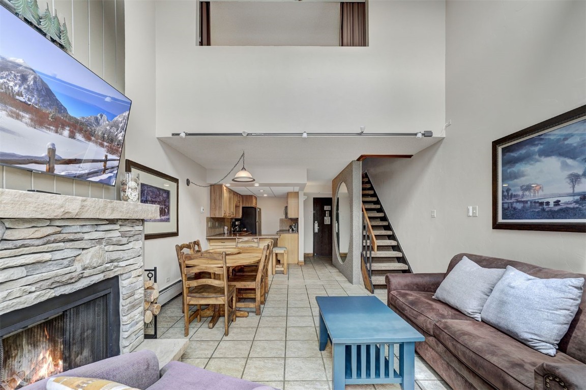 601 Village Road, Unit 503 Breckenridge, CO 80424 - Photo 12 of 48 a living room with furniture and a fireplace
