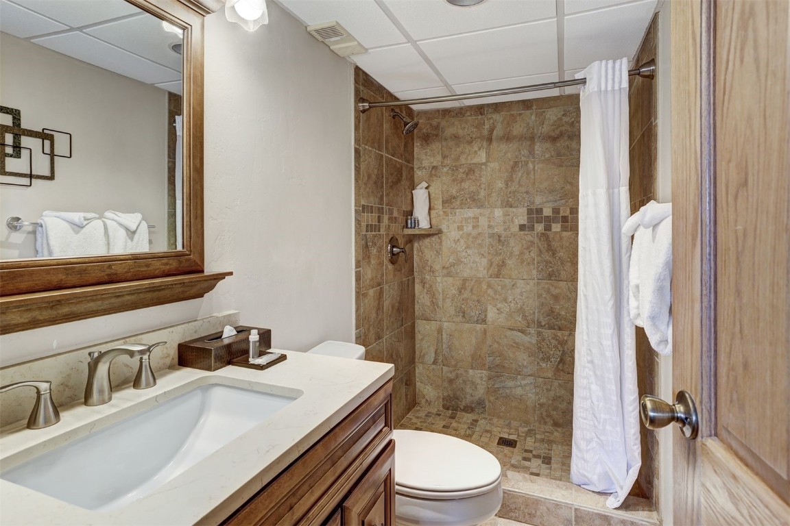 601 Village Road, Unit 503 Breckenridge, CO 80424 - Photo 17 of 48 a bathroom with a sink a toilet and shower