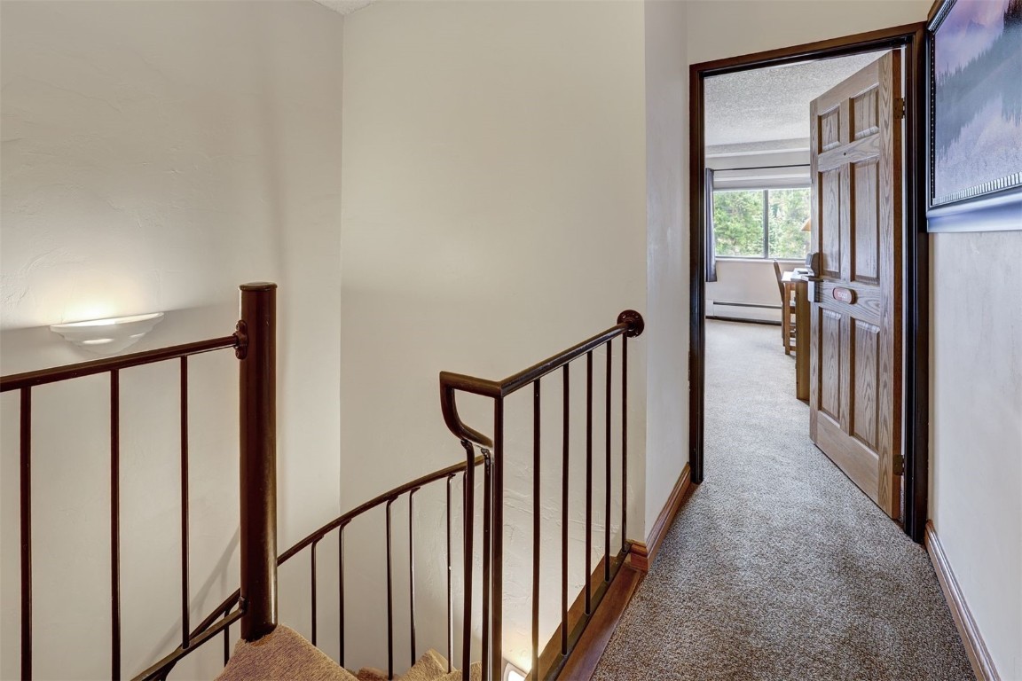 601 Village Road, Unit 503 Breckenridge, CO 80424 - Photo 19 of 48 a view of a hallway with a window