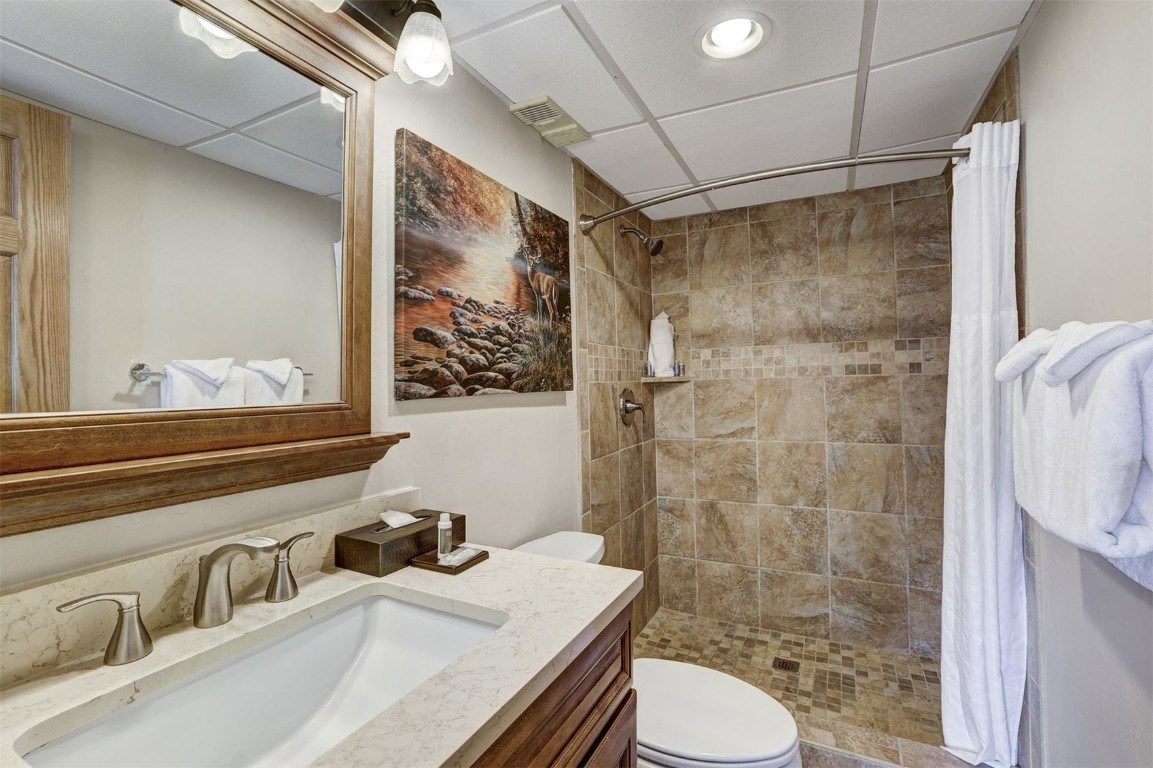 601 Village Road, Unit 503 Breckenridge, CO 80424 - Photo 22 of 48 a bathroom with a sink toilet and shower