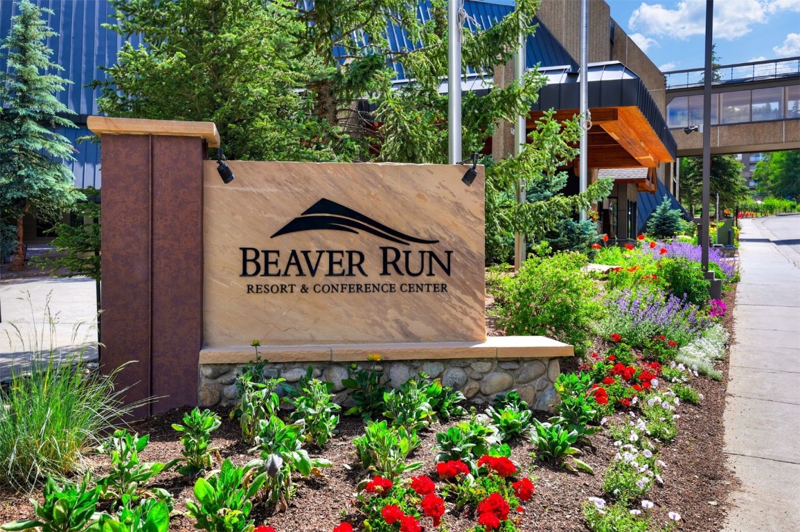 601 Village Road, Unit 503 Breckenridge, CO 80424 - Photo 23 of 48 a view of sign board with flower around