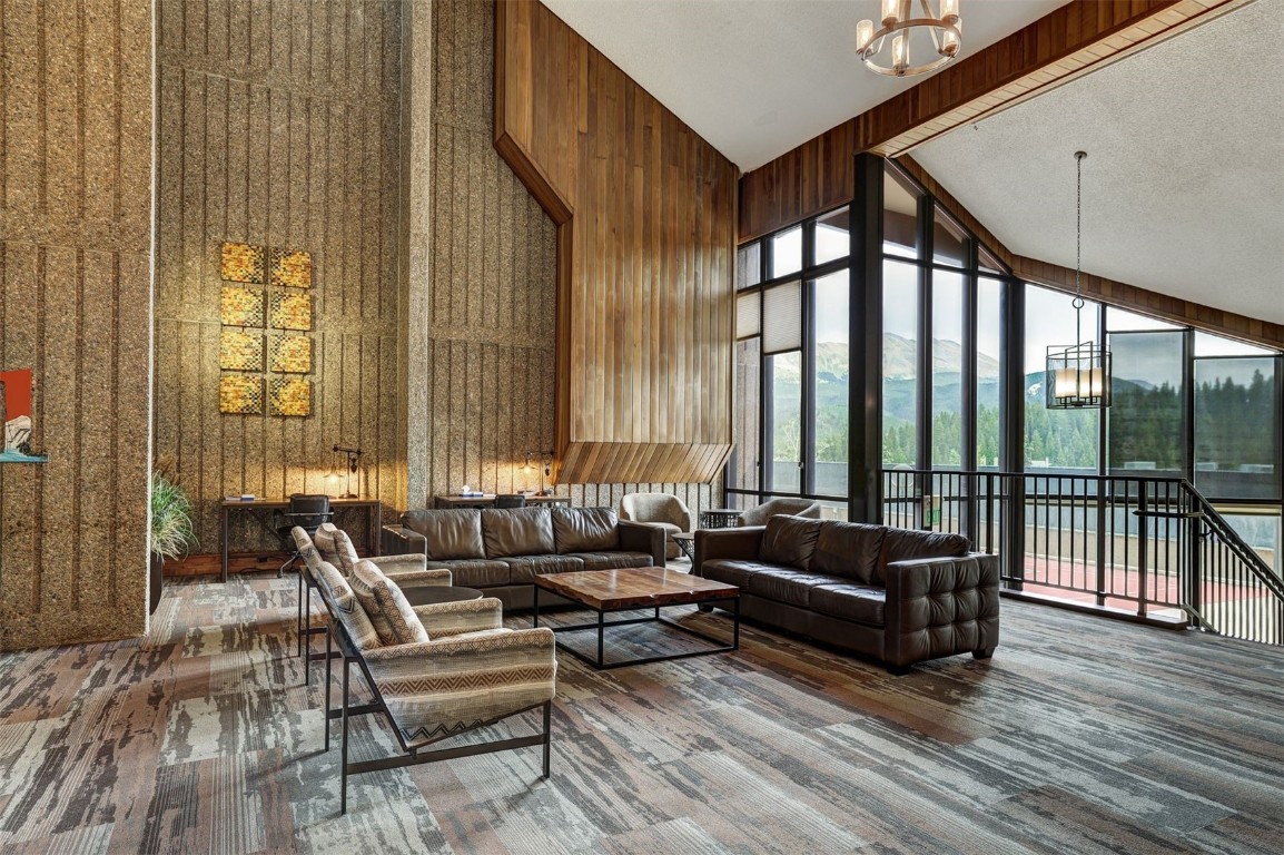 601 Village Road, Unit 503 Breckenridge, CO 80424 - Photo 32 of 48 a living room with furniture and large windows