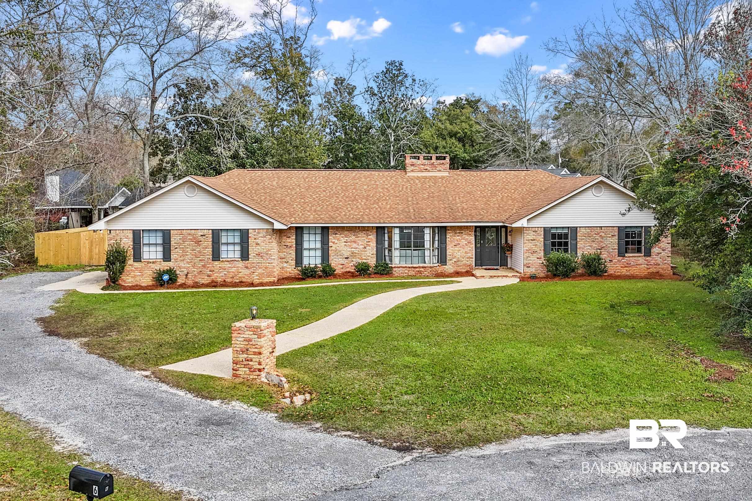 6 Wren Circle Foley, AL 36535 - Photo 51 of 55 Ranch-style home with a front yard, fence, brick siding, and driveway