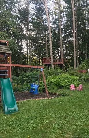 a view of a garden with a slide