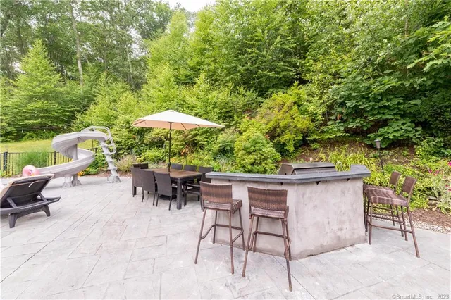 a garden view with a seating space