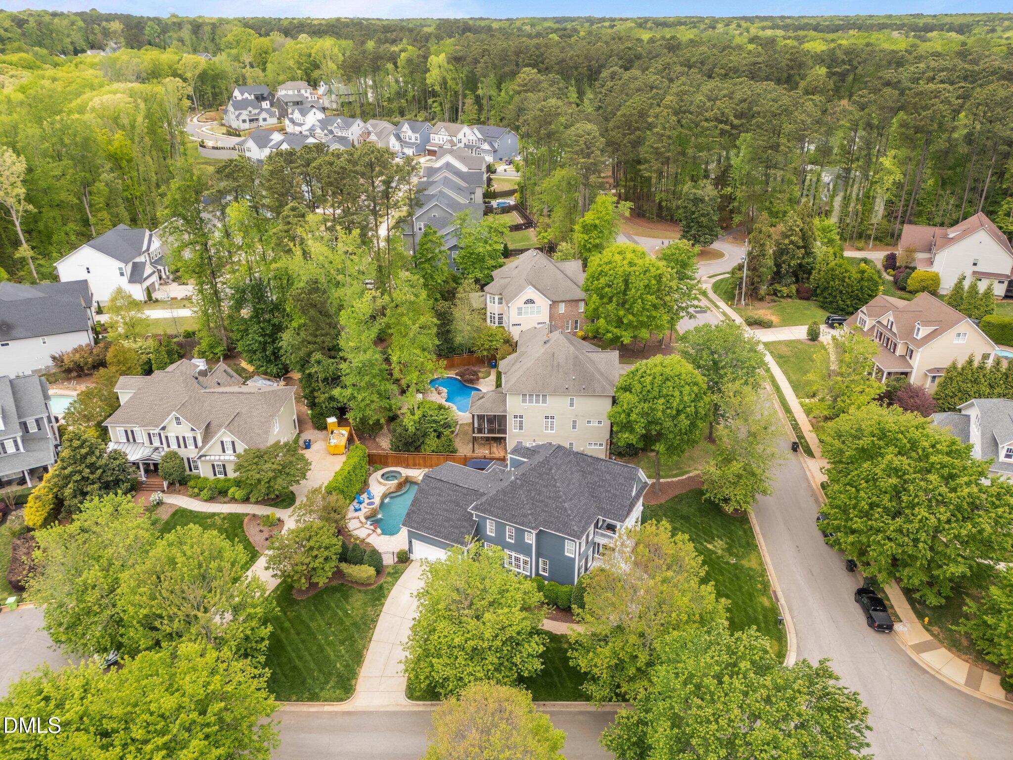 9329 Carlswood Court Raleigh, NC 27613 - Photo 8 of 73 60-web-or-mls-DJI_20250415125742_0388_D