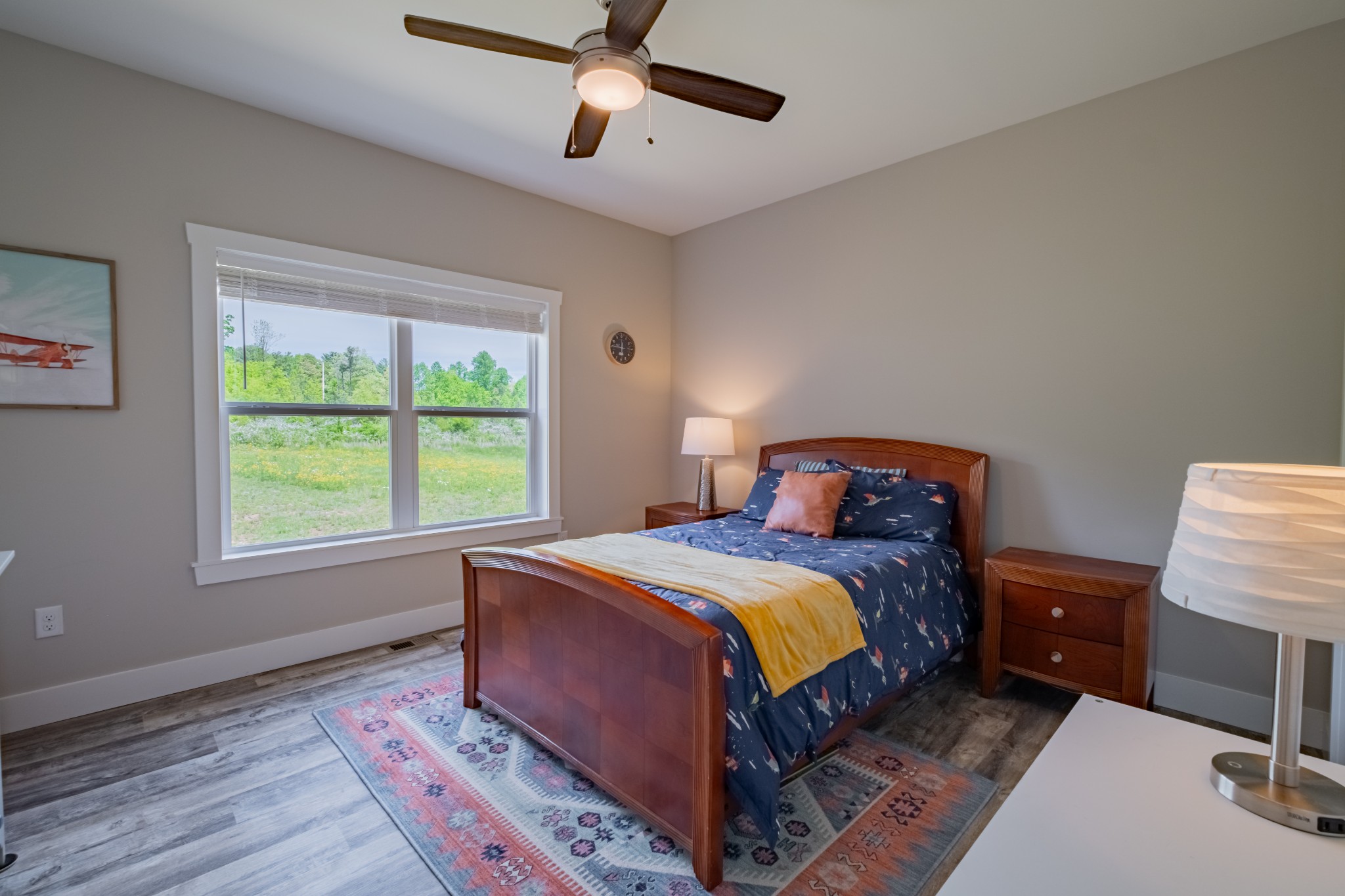 55 Rustling Pnes Road Dunlap, TN 37327 - Photo 24 of 45 a bedroom with a large bed and a chair