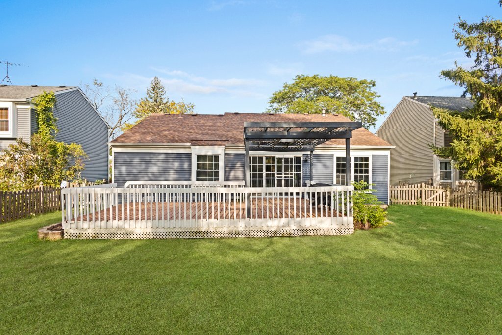 798 Burning Trail Carol Stream, IL 60188 - Photo 30 of 40 a front view of a house with a garden