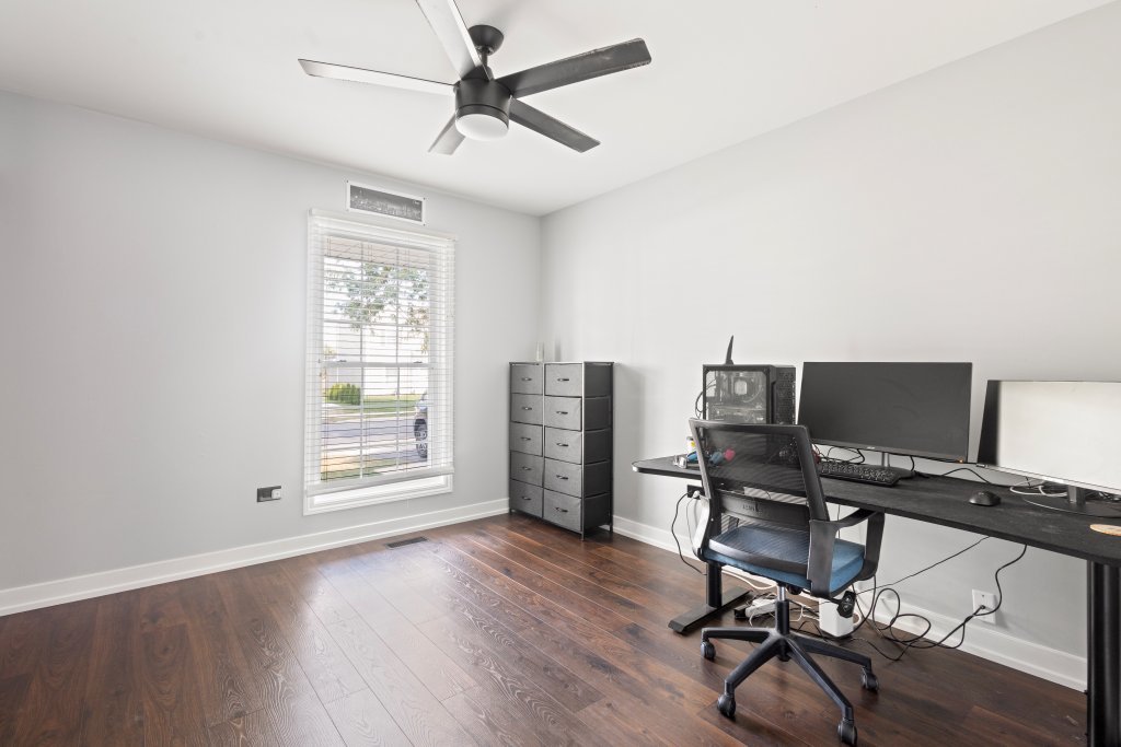 798 Burning Trail Carol Stream, IL 60188 - Photo 10 of 40 a view of a workspace with furniture and a window