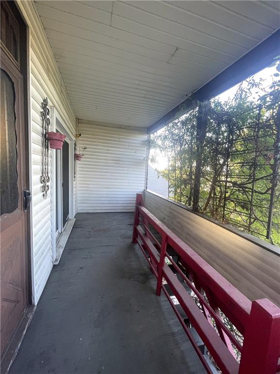 323 Hancock Street Pittsburgh, PA 15219 - Photo 14 of 41 a view of a two room with wooden floor and outdoor space