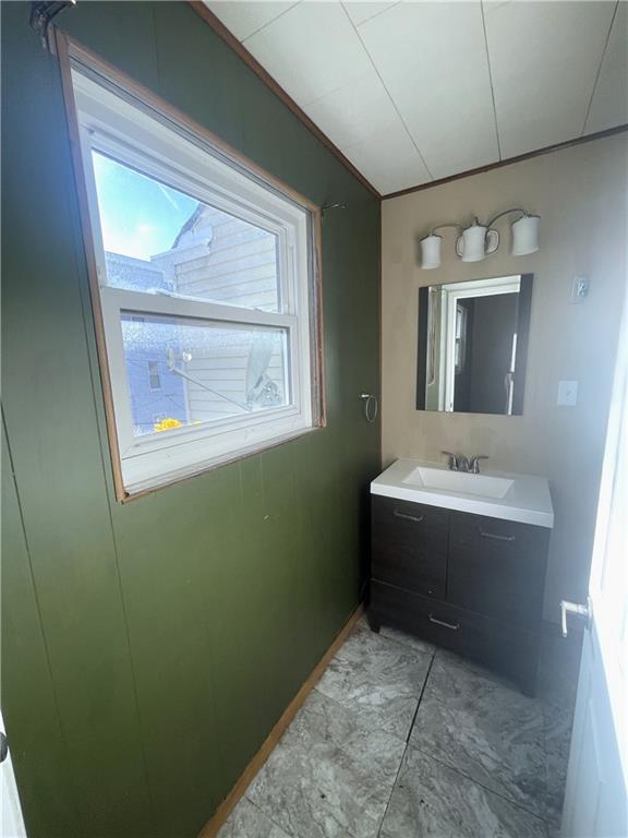 323 Hancock Street Pittsburgh, PA 15219 - Photo 18 of 41 a bathroom with a sink and a mirror