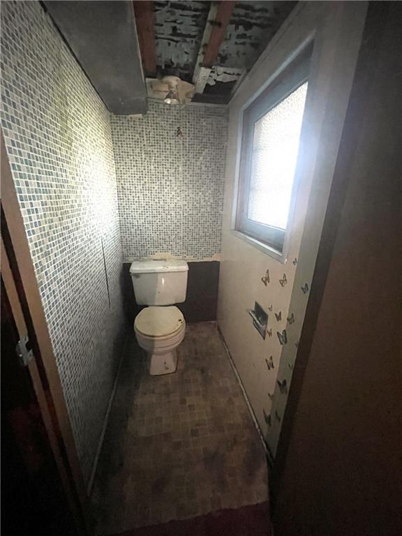 323 Hancock Street Pittsburgh, PA 15219 - Photo 30 of 41 a bathroom with a toilet and a shower